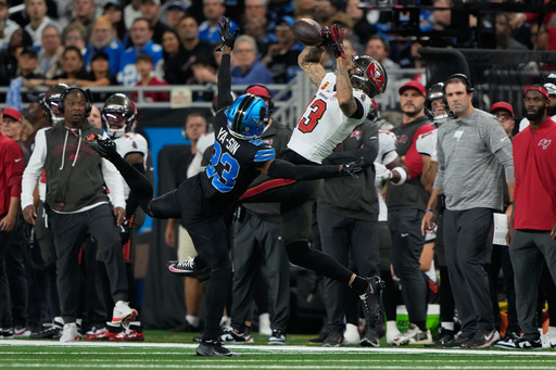 Tampa Bay Buccaneers wide receiver Mike Evans (13) makes a catch in front of Detroit Lions cornerback Rock Ya-Sin (23) during the first half of an NFL football game, Monday, Oct. 20, 2025, in Detroit. AP Photo/Ryan Sun) Tampa Bay Buccaneers wide receiver Mike Evans (13) makes a catch in front of Detroit Lions cornerback Rock Ya-Sin (23) during the first half of an NFL football game, Monday, Oct. 20, 2025, in Detroit. AP Photo/Ryan Sun)