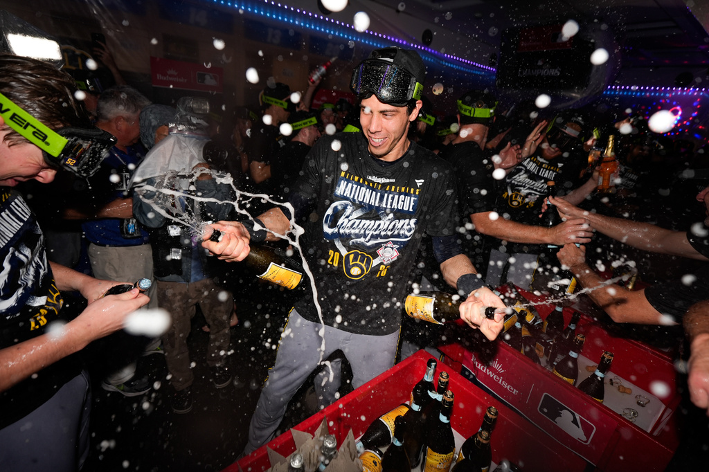 Milwaukee Brewers designated hitter Christian Yelich celebrates winning the NLCS Championship after Game 4 of baseball's National League Championship Series between the Milwaukee Brewers and the Los Angeles Dodgers, Thursday, Oct. 15, 2026, in Los Angeles. (AP Photo/Ashley Landis)