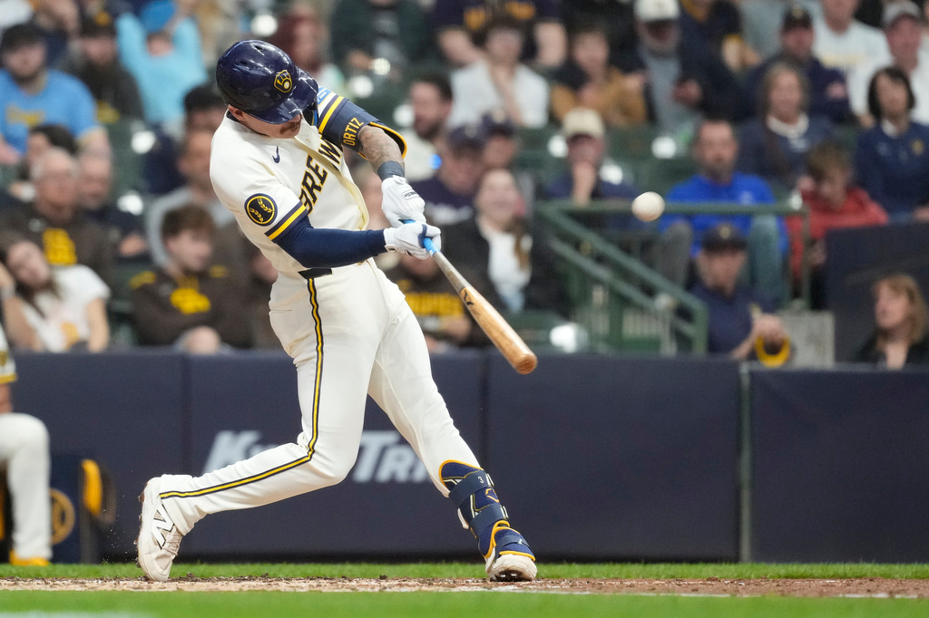 Milwaukee Brewers' Joey Ortiz hits a solo home run during the third inning of a baseball game against the San Diego Padres, Tuesday, May 12, 2026, in Milwaukee. (AP Photo/Aaron Gash)