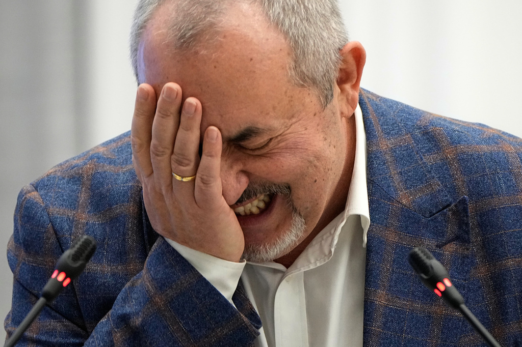 FILE - Boris Nadezhdin, a liberal Russian politician who is seeking to run in the March 17 presidential election, laughs during a meeting of the Russia's Central Election Commission in Moscow, Russia, Thursday, Feb. 8, 2024. (AP Photo/Alexander Zemlianichenko, File)