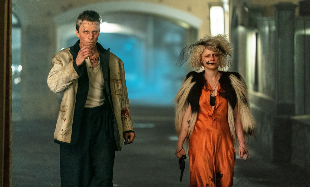 This image released by Warner Bros Entertainment shows Christian Bale, left, and Jessie Buckley in a scene from "The Bride!" (Warner Bros Entertainment via AP)