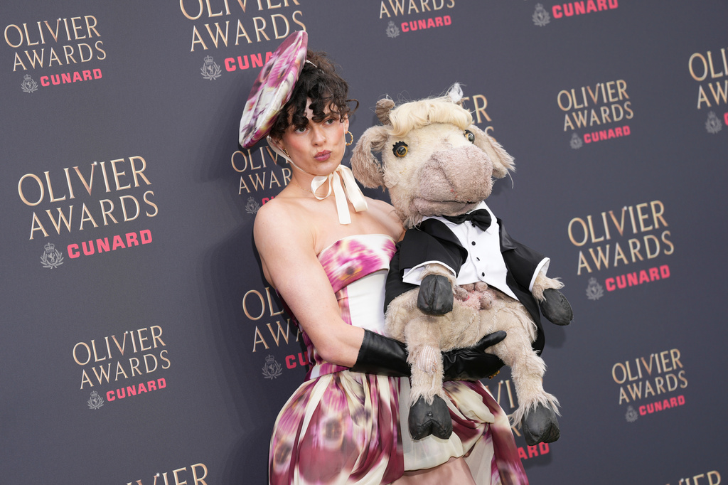 Jo Foster poses for photographers upon arrival at the Olivier Awards in London, England, Sunday, April 12, 2026. (Photo by Scott A Garfitt/Invision/AP)