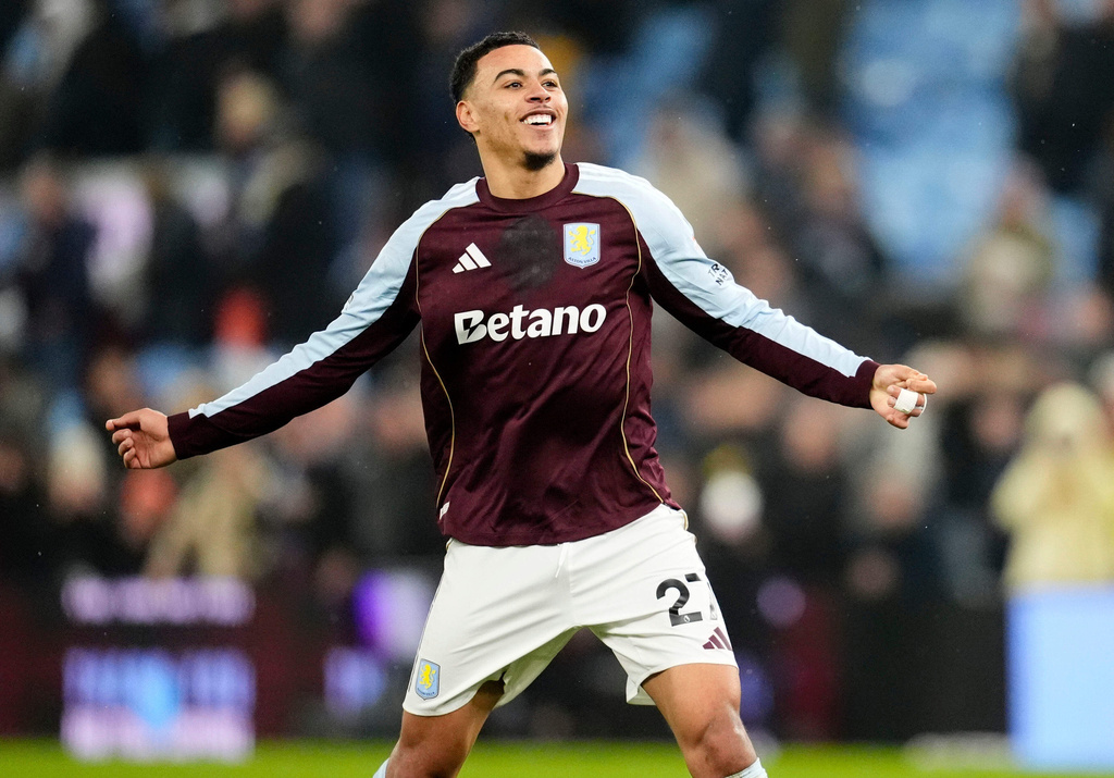 Aston Villa's Morgan Rogers celebrates winning the Premier League soccer match between Aston Villa and Manchester United, in Birmingham, England, Sunday Dec. 21, 2025. (Nick Potts/PA via AP)