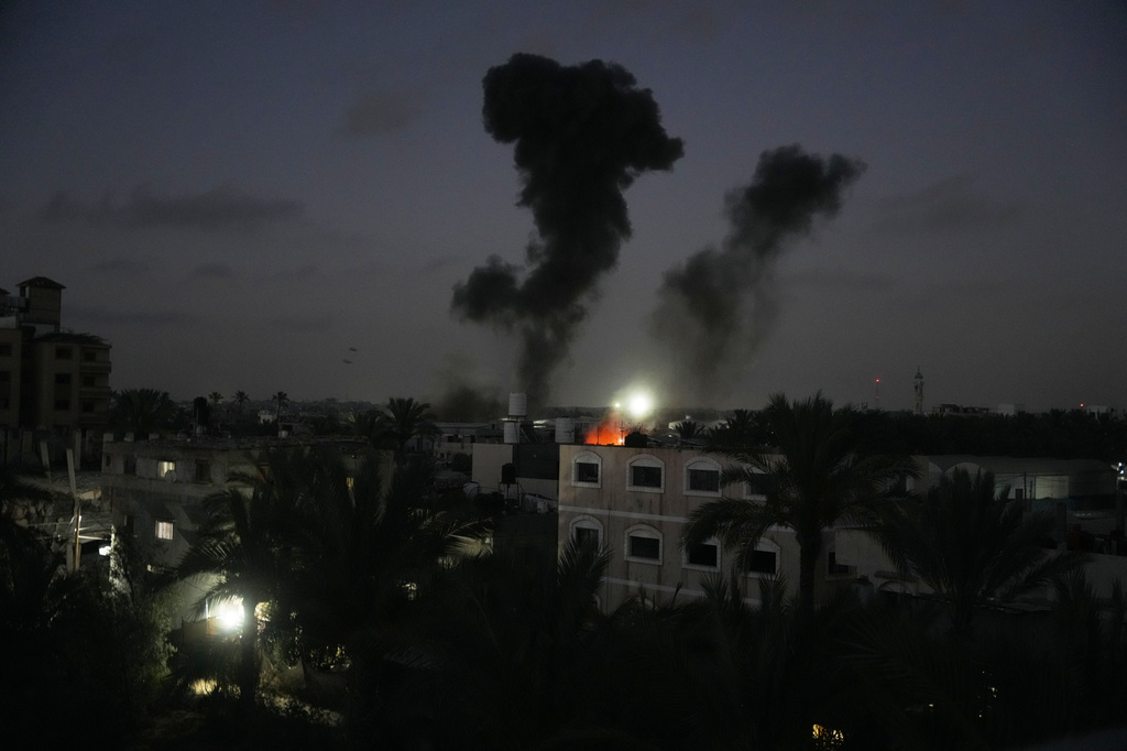 Smoke rises from an Israeli airstrike in Deir al-Balah, central Gaza Strip, Saturday, June 27, 2026. (AP Photo/Abdel Kareem Hana)