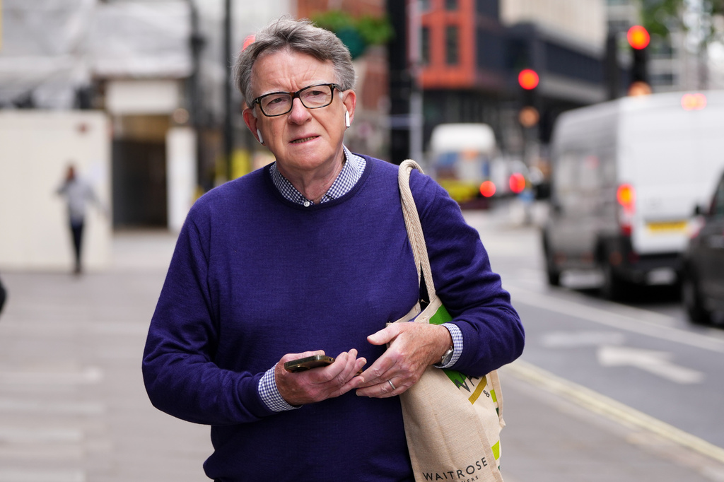 Peter Mandelson, the former U.K. ambassador to the United States, walks past the Ministry for Health in London, Thursday, May 14, 2026.(AP Photo/Kirsty Wigglesworth)