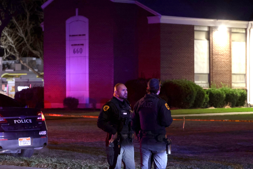 FILE - Police respond to a fatal shooting in a parking lot of The Church of Jesus Christ of Latter-day Saints in Salt Lake City on Wednesday, Jan. 7, 2026. (Laura Seitz/The Deseret News via AP, File)