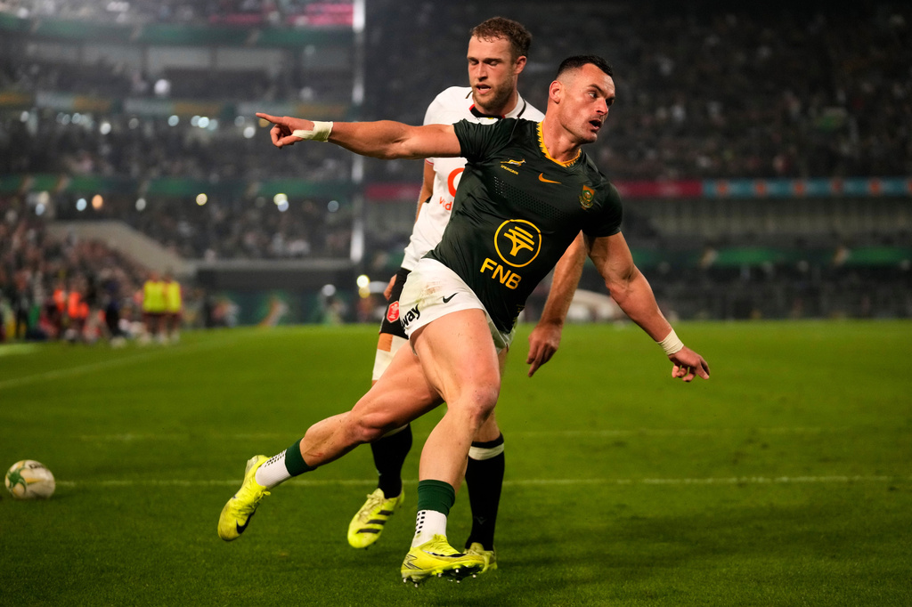 South Africa's Jesse Kriel, center, celebrates after scoring a try during the Nations Championship Test rugby match between South Africa and Wales, in Durban, Saturday, July 18, 2026. (AP Photo/Themba Hadebe)