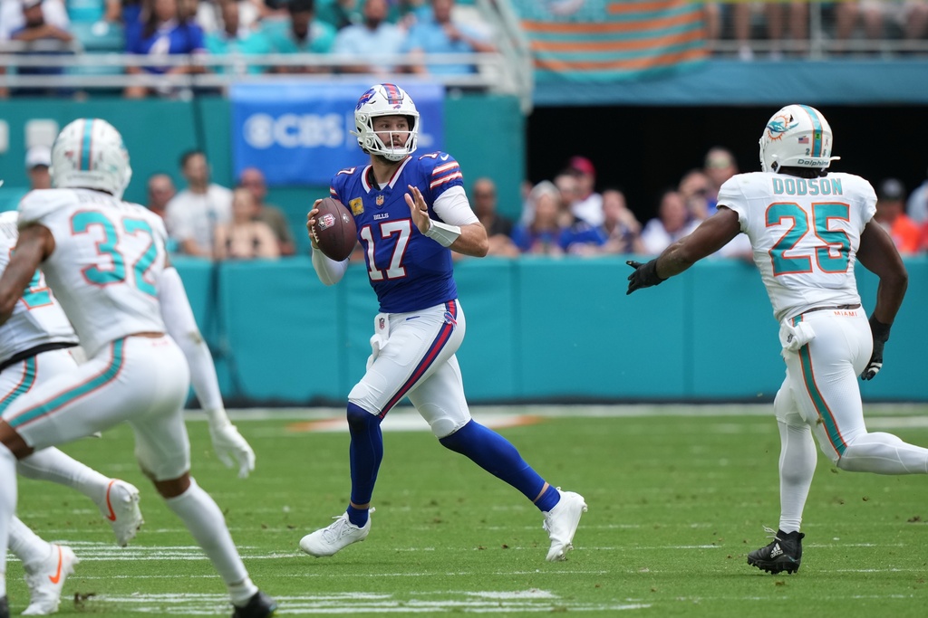Buffalo Bills quarterback Josh Allen (17) looks to throw during the first half of an NFL football game against the Miami Dolphins, Sunday, Nov. 9, 2025, in Miami Gardens, Fla. (AP Photo/Lynne Sladky)