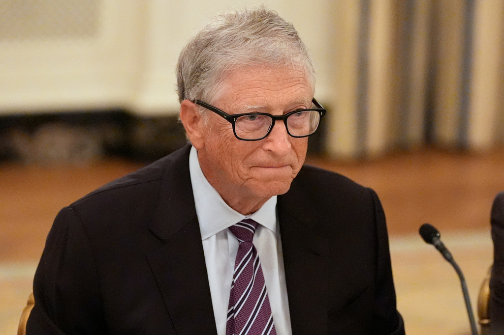 FILE - Microsoft's Bill Gates attends a dinner with President Donald Trump in the State Dining Room of the White House, Sept. 4, 2025, in Washington. (AP Photo/Alex Brandon, File)