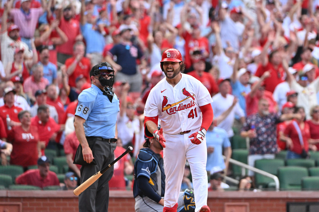 St. Louis Cardinals' Alec Burleson (41) reacts after hitting a homer against the Tampa Bay Rays during the sixth inning of an opening-day baseball game, Thursday, March 26, 2026, in St. Louis. (AP Photo/Jeff Le)