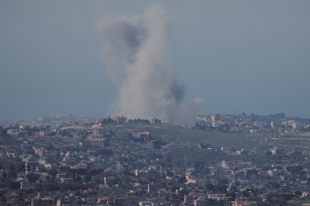Smoke rises following Israeli bombardment in southern Lebanon as seen from northern Israel Monday, March 2, 2026. (AP Photo/Ariel Schalit)