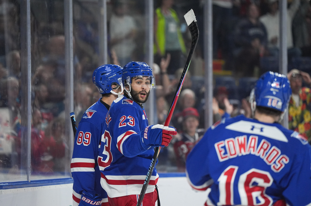 Kitchener Rangers' Sam O'Reilly (23) celebrates his goal during the second period of a Memorial Cup hockey game against the Chicoutimi Sagueneens, in Kelowna, B.C., on Tuesday, May 26, 2026. (Darryl Dyck/The Canadian Press via AP)