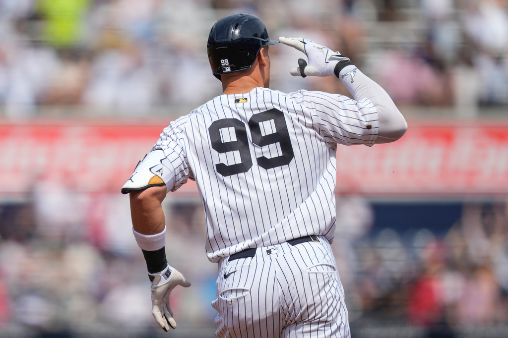 New York Yankees' Aaron Judge (99) celebrates after hitting a home run during the first inning of a baseball game against the Los Angeles Angels, Thursday, April 16, 2026, in New York. (AP Photo/Yuki Iwamura)