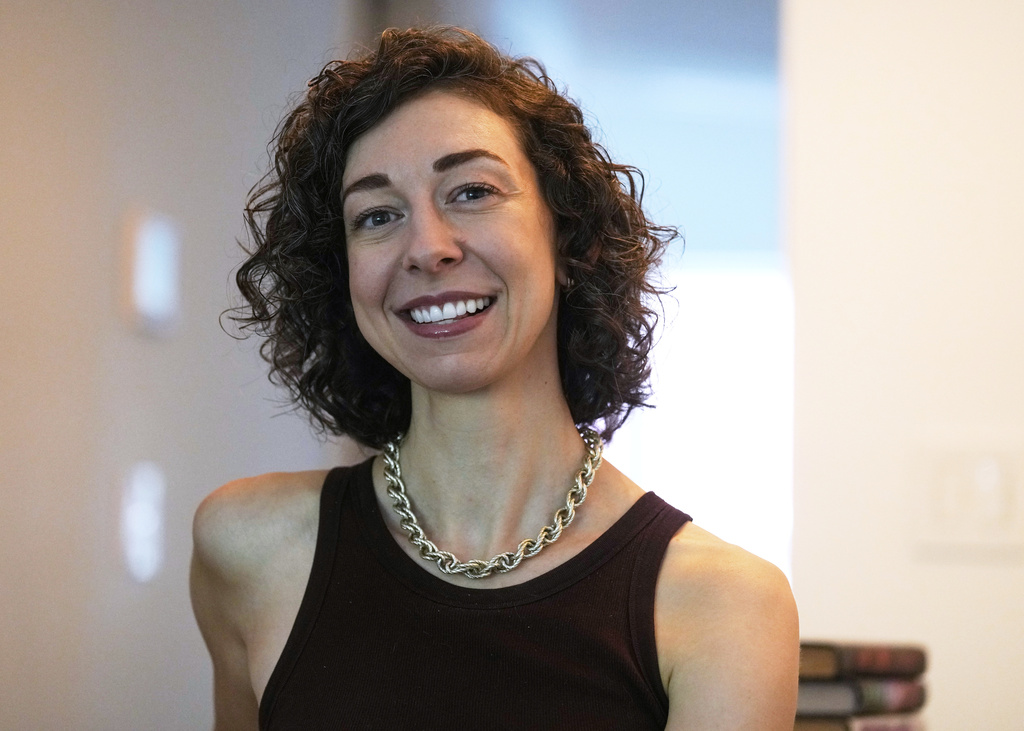 Thriller novelist Andrea Bartz is photographed in her home, in the Brooklyn borough of New York, Thursday, Sept. 4, 2025 (AP Photo/Richard Drew)