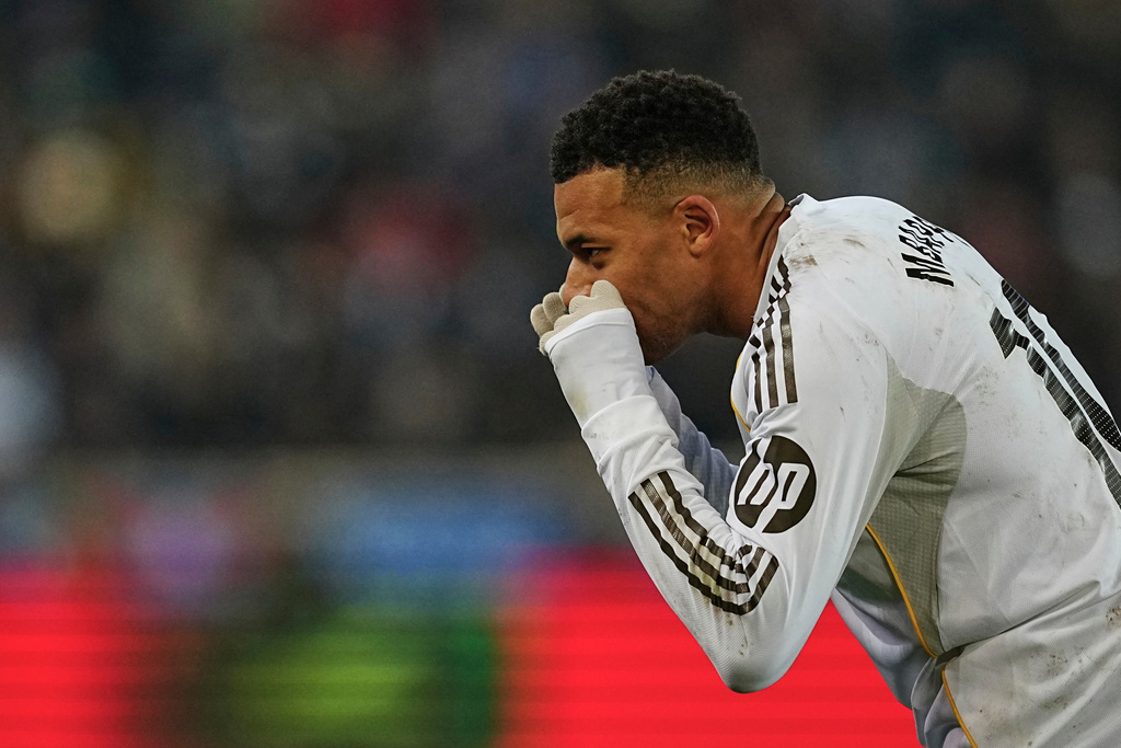 Real Madrid's Kylian Mbappe celebrates after scoring the opening goal during the Spanish La Liga soccer match between Alaves and Real Madrid in Vitoria-Gasteiz, Spain, Sunday, Dec. 14, 2025. (AP Photo/Miguel Oses)