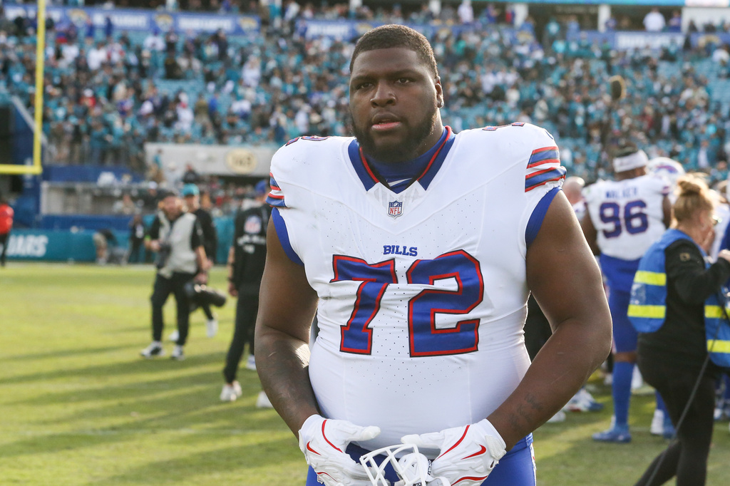 FILE - Buffalo Bills defensive tackle Phidarian Mathis (72) leaves the field after defeating the Jacksonville Jaguars in an NFL wild card playoff football game, Sunday, Jan. 11, 2026, in Jacksonville, Fla. (AP Photo/Gary McCullough, File)