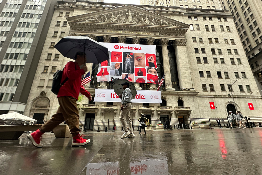 FILE - Banners for Pinterest, displayed to mark the fifth anniversary of the company's listing, hang on the front of the New York Stock Exchange in New York, May 15, 2024. (AP Photo/Peter Morgan, File)