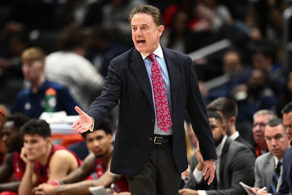 St. John's head coach Rick Pitino gestures during the first half of an NCAA college basketball game against Georgetown, Wednesday, Dec. 31, 2025, in Washington. (AP Photo/Nick Wass)