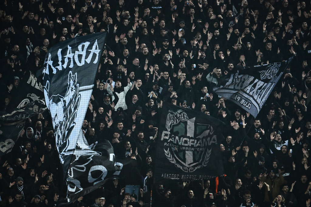 PAOK's fans wave giant flags of their team during the Europa League soccer match between PAOK and Real Betis in Thessaloniki, Greece, Thursday, Jan. 22, 2026. (AP Photo/Giannis Papanikos)