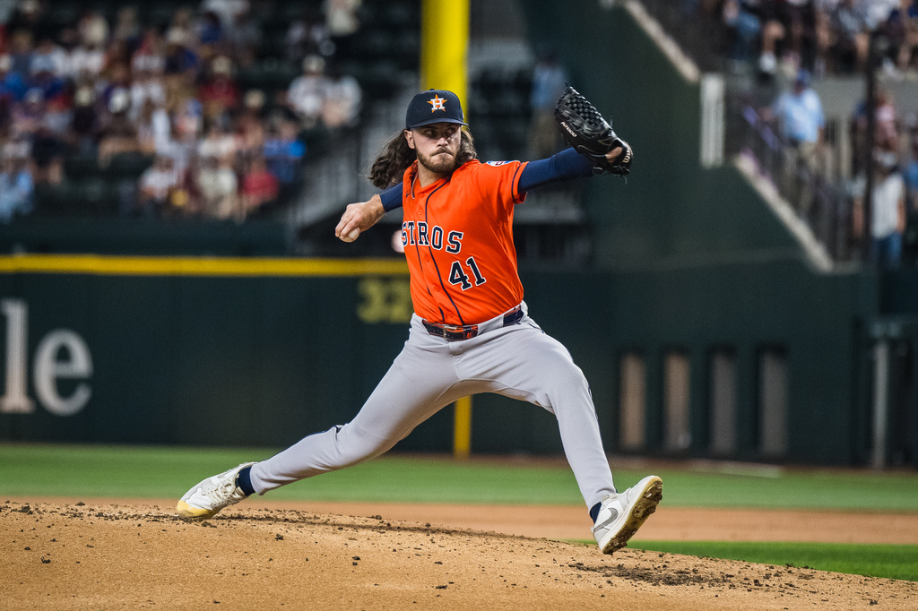 Houston Astros' Spencer Arrighetti pitches during the first inning of a baseball game against the Texas Rangers, Thursday, May 28, 2026, Arlington, Texas. (AP Photo/Jessica Tobias)