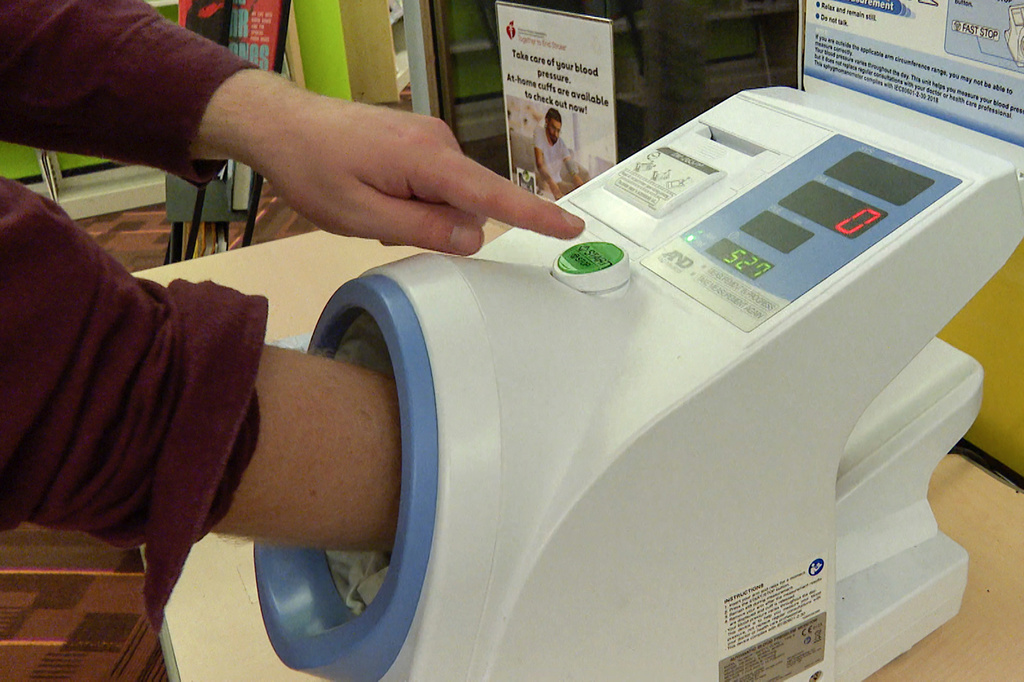 FILE - A free blood pressure machine is used at the public library in Kansas City, Mo., on Nov. 19, 2024. (AP Photo/Nick Ingram, File)