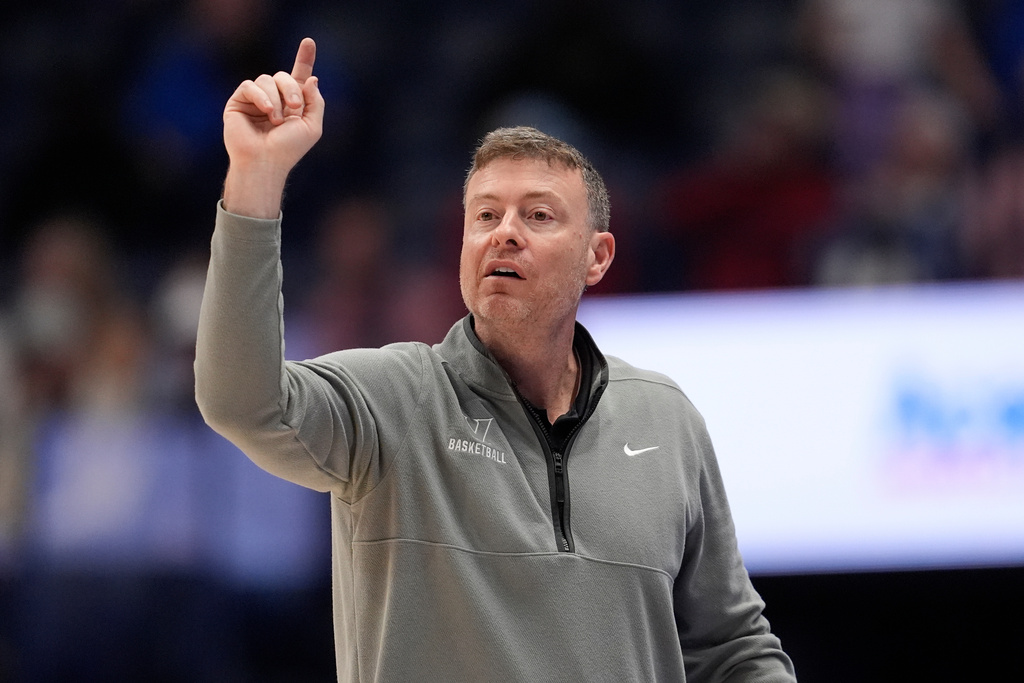 Vanderbilt head coach Mark Byington gives instructions to his players during the first half of an NCAA college basketball game against Florida in the semifinals of the Southeastern Conference tournament Saturday, March 14, 2026, in Nashville, Tenn. (AP Photo/George Walker IV)
