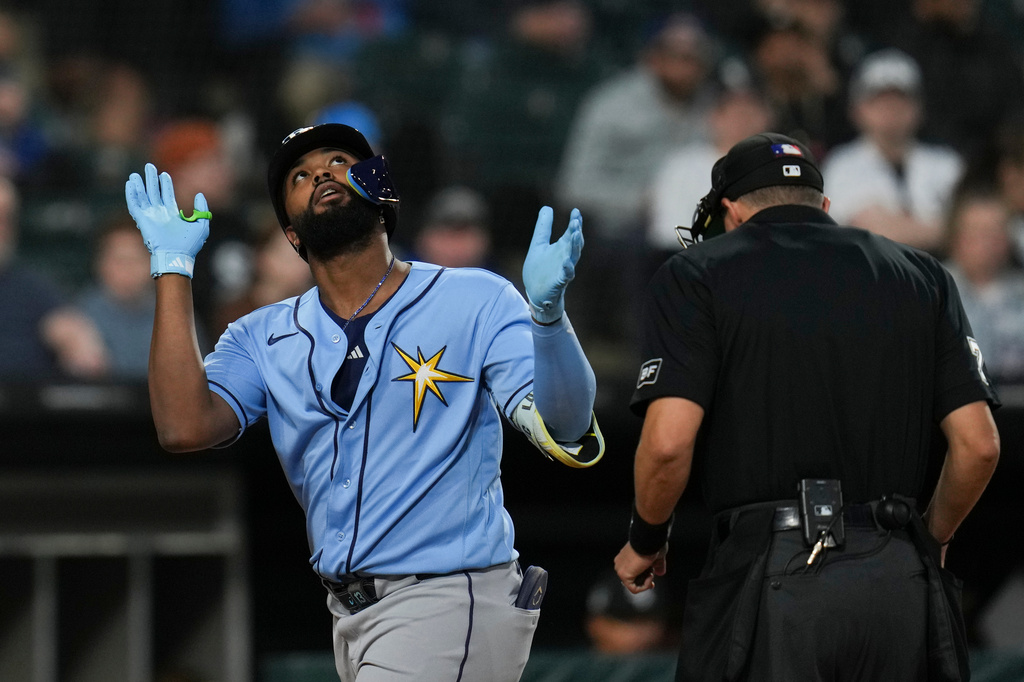 Tampa Bay Rays's Junior Caminero (13) celebrates after hitting a home run during the second inning of a baseball game against the Chicago White Sox, Wednesday, April 15, 2026, in Chicago. (AP Photo/Erin Hooley)