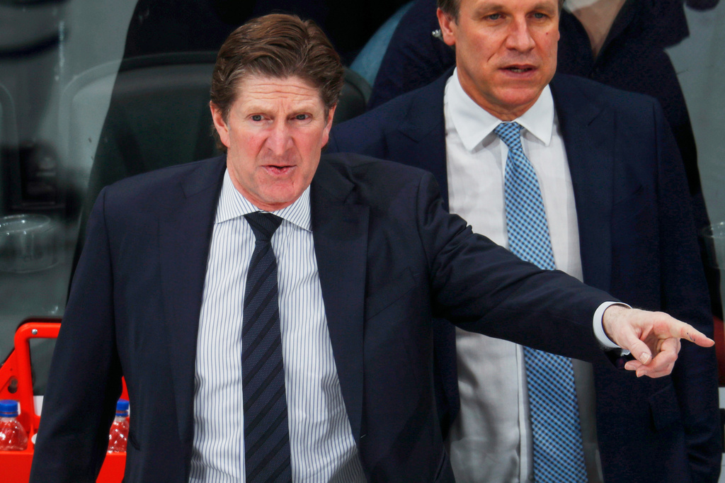 FILE - Toronto Maple Leafs head coach Mike Babcock directs his team against the Colorado Avalanche in the third period of an NHL hockey game, Feb. 12, 2019, in Denver. (AP Photo/David Zalubowski, File)