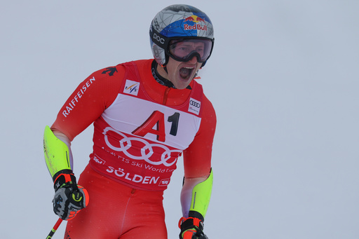 Switzerland's Marco Odermatt celebrates at the finish area of an alpine ski, men's World Cup giant slalom, in Soelden, Austria, Sunday, Oct. 26, 2025. (AP Photo/Alessandro Trovati) Switzerland's Marco Odermatt celebrates at the finish area of an alpine ski, men's World Cup giant slalom, in Soelden, Austria, Sunday, Oct. 26, 2025. (AP Photo/Alessandro Trovati)