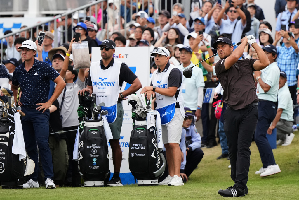Xander Schauﬀele, of the U.S., tees off on the 17th hole during the final round of the Baycurrent Classic golf tournament at the Yokohama Country Club in Yokohama, near Tokyo, Sunday, Oct. 12, 2025. (AP Photo/Hiro Komae)