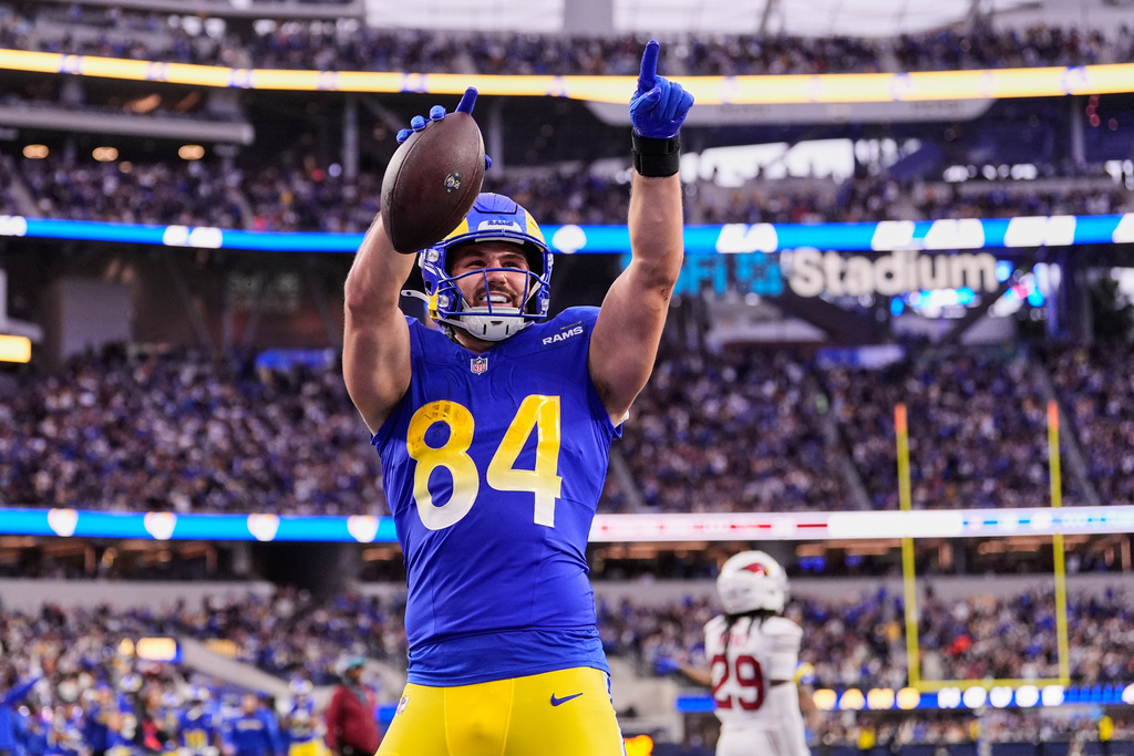 Los Angeles Rams tight end Colby Parkinson (84) celebrates after scoring a touchdown during the second half of an NFL football game against the Arizona Cardinals, Sunday, Jan. 4, 2026, in Inglewood, Calif. (AP Photo/Mark J. Terrill)