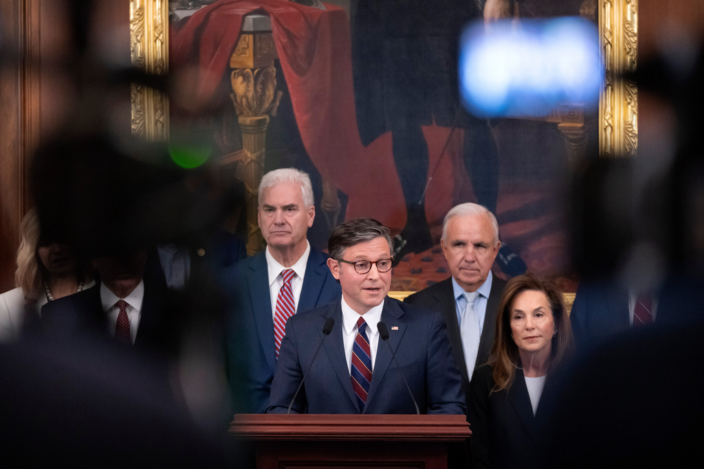 Speaker of the House Mike Johnson, R-La., center, is joined by, from left, House Majority Whip Tom Emmer of Minn., Rep. Carlos Gimenez, R-Fla., and House Republican Conference Chairwoman Lisa McClain, of Mich., as he speaks with reporters at the Capitol in Washington, Thursday, Nov. 6, 2025. (AP Photo/Mark Schiefelbein)