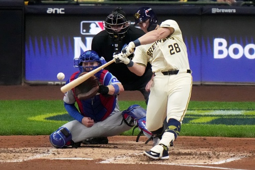Milwaukee Brewers' Andrew Vaughn hits a home run during the fourth inning of Game 5 of baseball's National League Division Series against the Chicago Cubs Saturday, Oct. 11, 2025, in Milwaukee. (AP Photo/Morry Gash) Milwaukee Brewers' Andrew Vaughn hits a home run during the fourth inning of Game 5 of baseball's National League Division Series against the Chicago Cubs Saturday, Oct. 11, 2025, in Milwaukee. (AP Photo/Morry Gash)