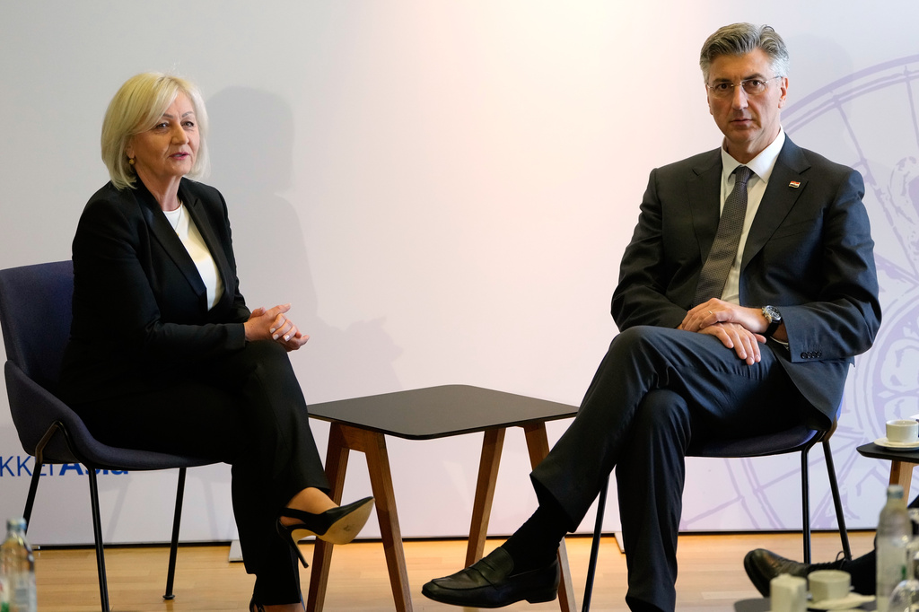 Croatia Prime Minister Andrej Plenkovic, right, welcomes Chairwoman of the Council of Ministers of Bosnia and Herzegovina Borjana Kristo at the Three Seas Initiative summit in Dubrovnik, Croatia, Tuesday, April 28, 2026. (AP Photo/Darko Bandic)