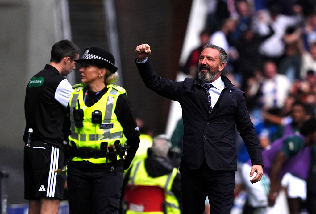 Rangers manager Derek McInnes celebrates their side's first goal during the Scottish League Cup soccer match between Rangers and Celtic, in Glasgow, Sunday Sept. 13, 2026. (Andrew Milligan/PA via AP)