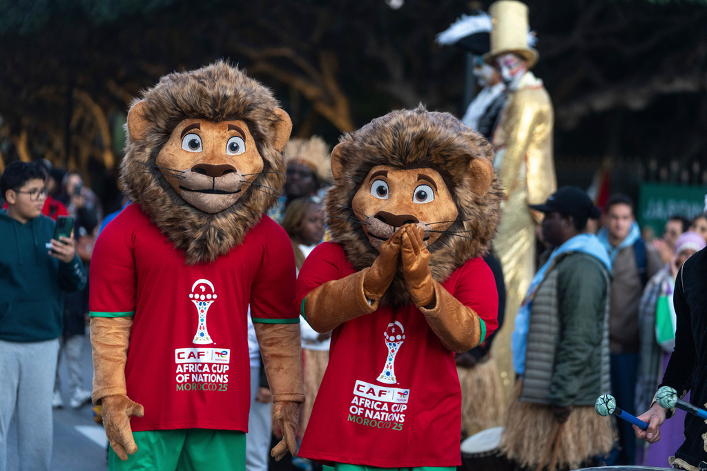 People dressed as mascots take part in a parade celebrating the upcoming Africa Cup of Nations soccer competition, in Rabat, Morocco, Saturday, Dec. 20, 2025. (AP Photo/Mosa'ab Elshamy)