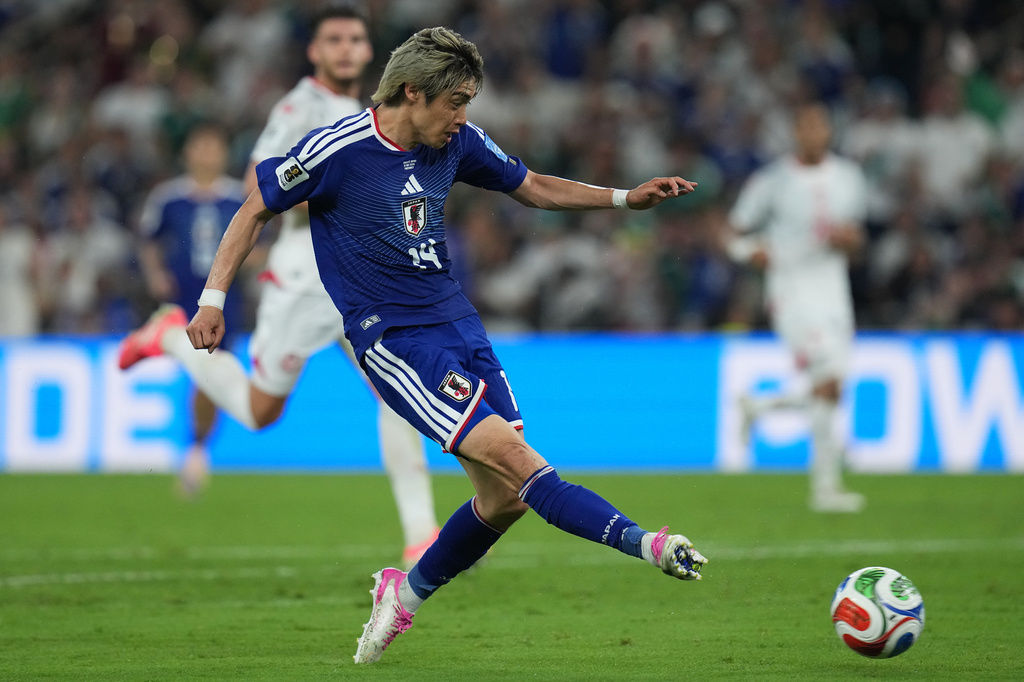 Japan's Junya Ito scores his side's third goal against Tunisia during a World Cup Group F soccer match in Guadalupe, near Monterrey, Mexico, Saturday, June 20, 2026. (AP Photo/Dolores Ochoa)