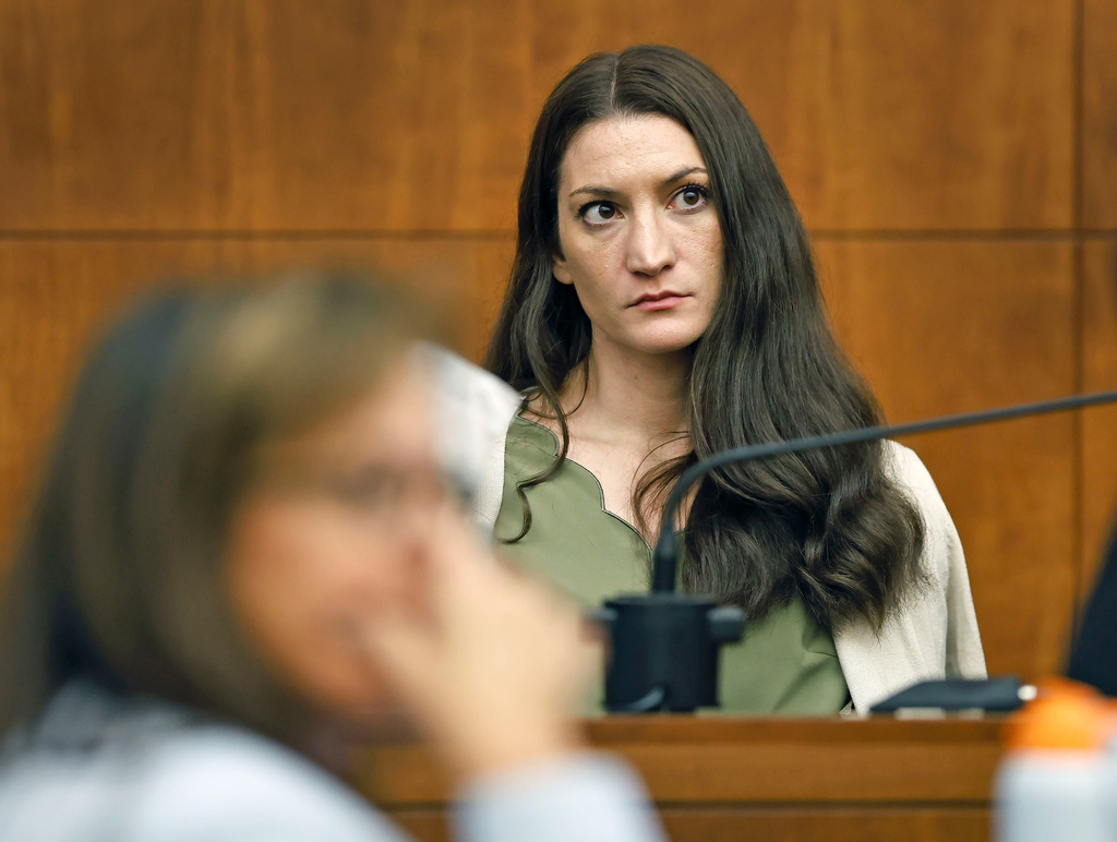 Lindsay Clancy waits for the judge to call a prospective jury member into court in her murder trial where she is charged in the 2023 killing of her three children, Wednesday, July 22, 2026, in Plymouth Superior Court in Plymouth, Mass. (Greg Derr/The Patriot Ledger via AP, Pool)