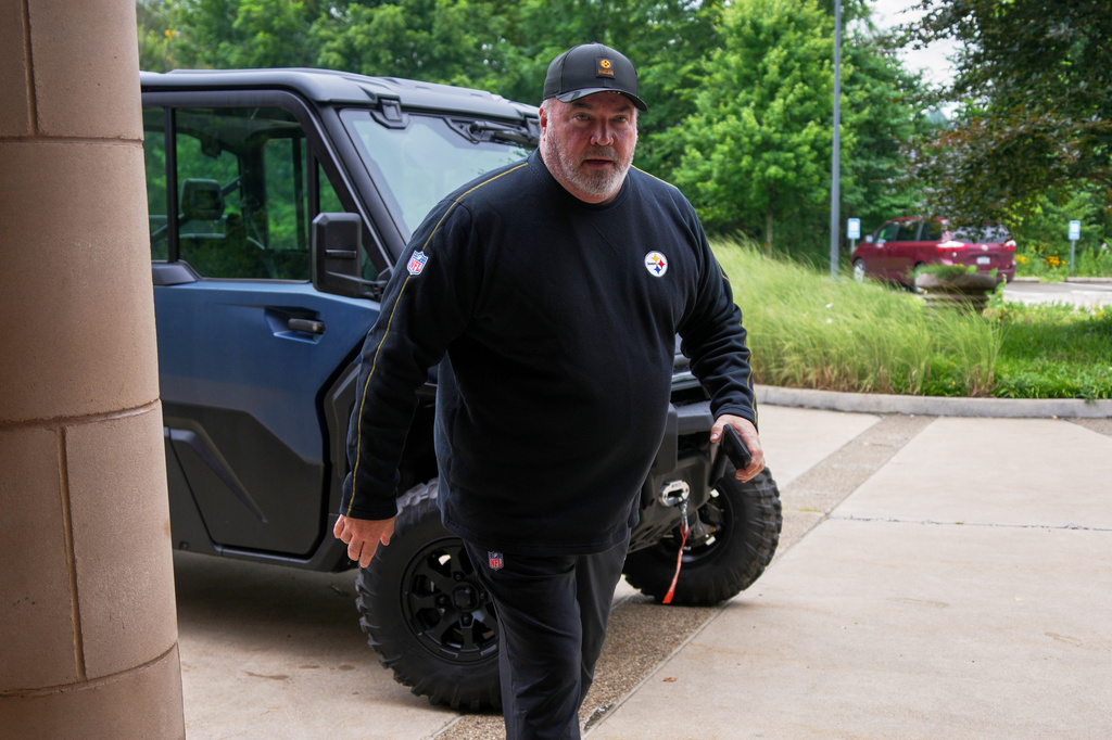 Pittsburgh Steelers head coach Mike McCarthy arrives to meet with reporters at the NFL football team's camp in Latrobe, Pa., Tuesday, July 28, 2026. (AP Photo/Gene J. Puskar)