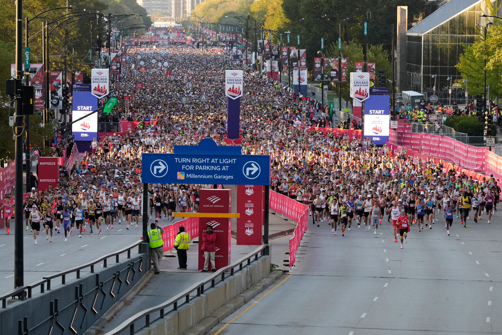 Runners participate in the Chicago Marathon, Sunday, Oct. 12, 2025. (AP Photo/Nam Y. Huh)