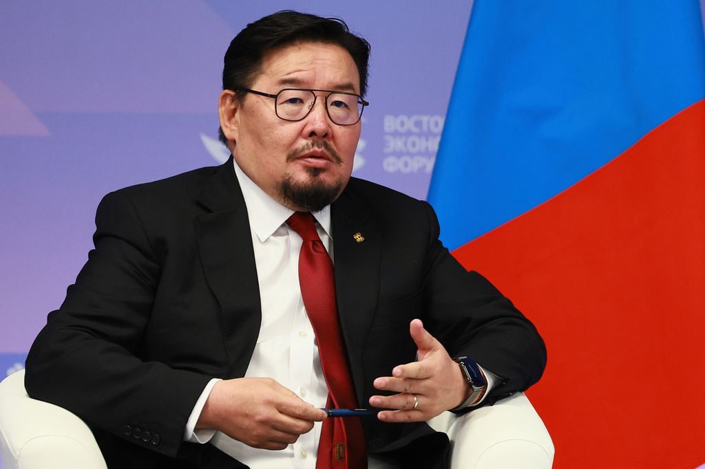 FILE - Mongolian Prime Minister Gombojavyn Zandanshatar speaks to Russian President Vladimir Putin during their meeting on the sidelines of the Eastern Economic Forum in Vladivostok, Russia, Sept. 4, 2025. (Vladimir Smirnov, Sputnik, Kremlin Pool Photo via AP, File)
