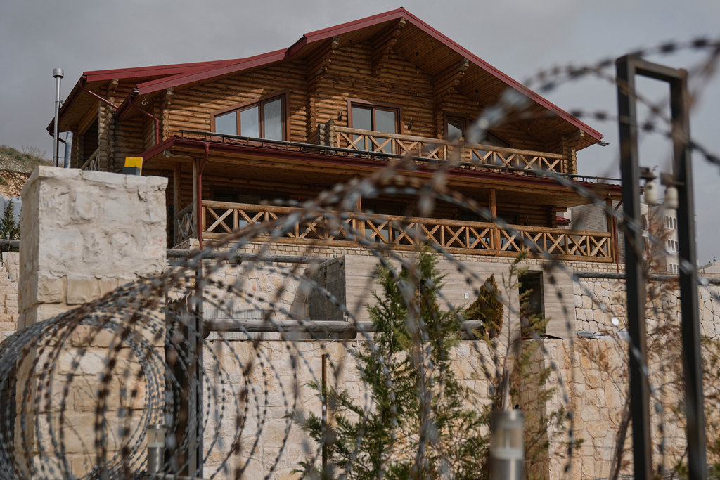 The "Wood Villa" in the eastern city of Zahleh, Lebanon, Tuesday, Feb. 17, 2026, that was allegedly used as a base by the kidnappers who lured retired Lebanese officer Ahmed Shukr to a nearby area from where they whisked him away. (AP Photo/Bilal Hussein)