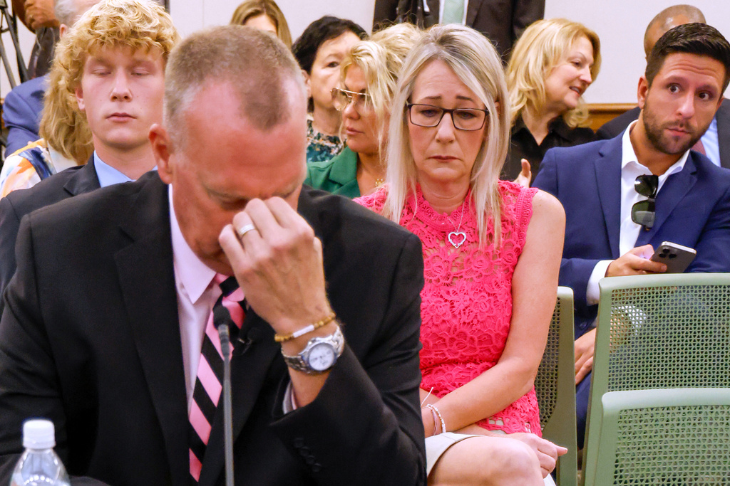 Steve Federico gathers himself as he waits to testify about his daughter Logan Federico, who was murdered, during The House Judiciary Subcommittee on Oversight field hearing on violent crime in Charlotte, N.C., Monday, Sept. 29, 2025. (AP Photo/Nell Redmond)
