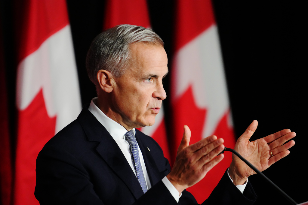 Canada Prime Minister Mark Carney makes a live address on Canada's plan to build a stronger economy in advance of the 2025 Budget, at the University of Ottawa in Ottawa on Wednesday, Oct. 22, 2025. (Sean Kilpatrick/The Canadian Press via AP)