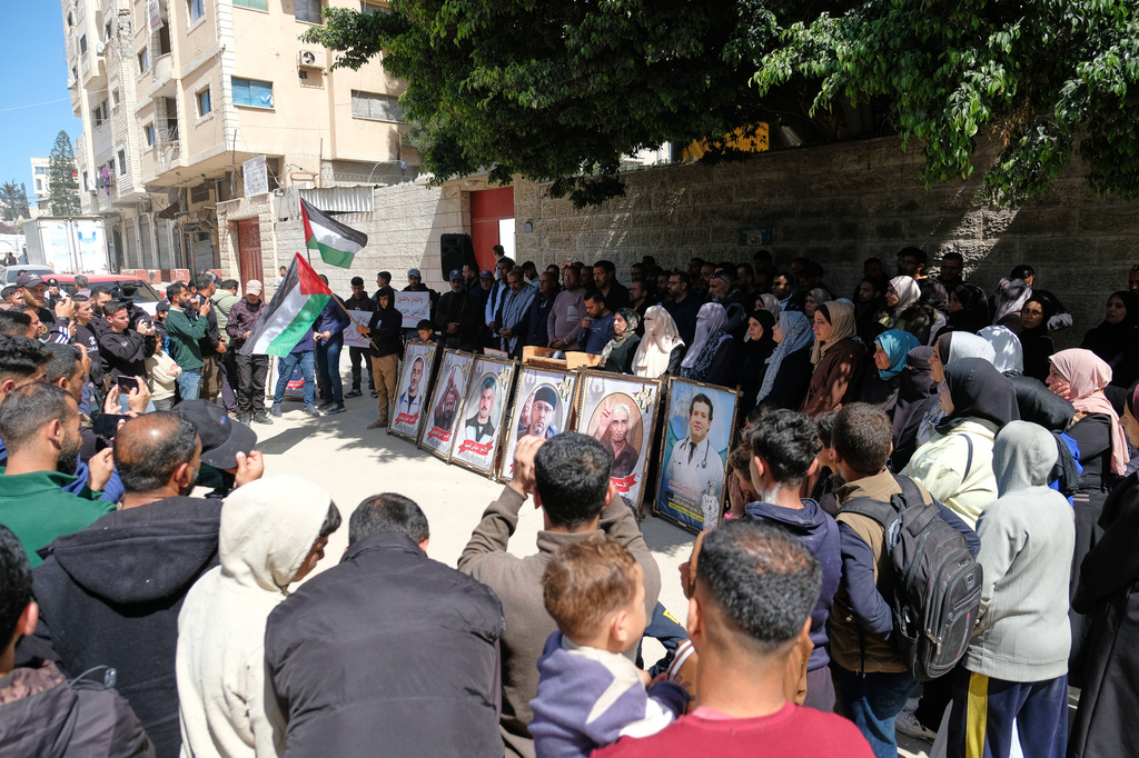 Relatives of Palestinian prisoners held in Israeli jails demonstrated against the decision by Israel's parliament to approve the death penalty for Palestinians convicted of murdering Israelis in front of the Red Cross headquarters in Gaza City, Tuesday, March 31, 2026. (AP Photo/Jehad Alshrafi)