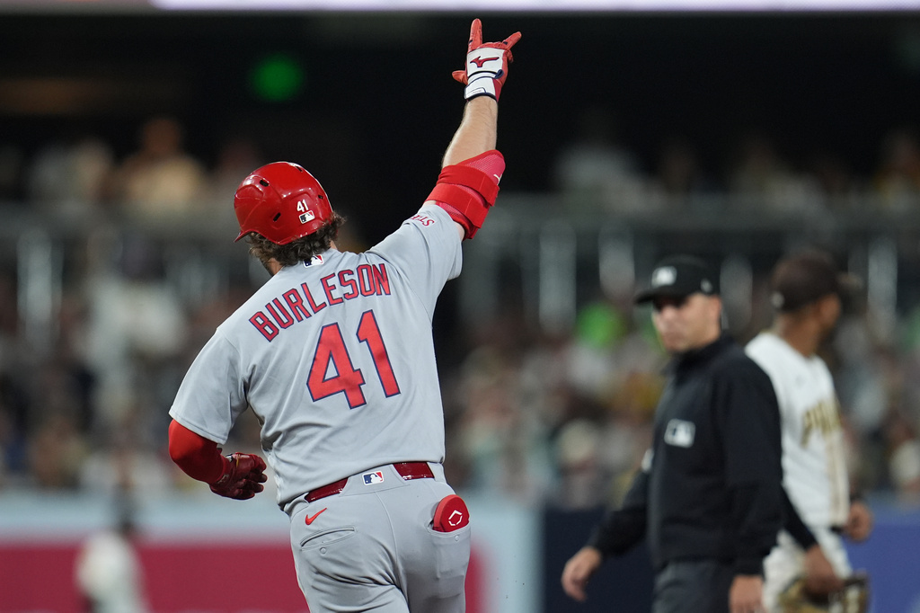 St. Louis Cardinals' Alec Burleson celebrates his home run during the fourth inning of a baseball game against the San Diego Padres Thursday, May 7, 2026, in San Diego. (AP Photo/Gregory Bull)