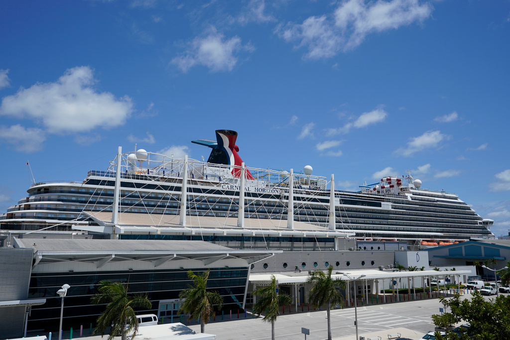 FILE - Carnival Cruise Line's Carnival Horizon cruise ship is shown docked at PortMiami, April 9, 2021, in Miami. (AP Photo/Wilfredo Lee, File)