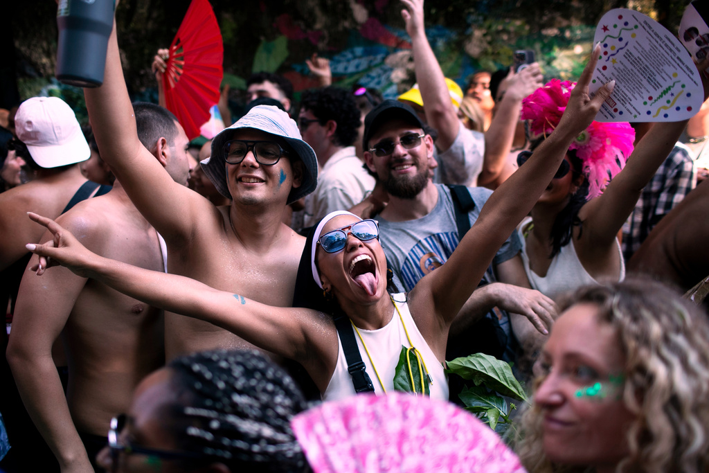 Revelers attend the Carmelitas street party on the first official day of Carnival in Rio de Janeiro, Friday, Feb. 13, 2026. (AP Photo/Bruna Prado)