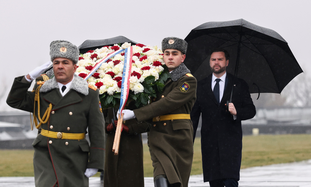 U.S. Vice President JD Vance takes part in the wreath-laying ceremony during a visit to the Tsitsernakaberd Armenian Genocide Memorial in Yerevan, Armenia Tuesday, Feb. 10, 2026. (Kevin Lamarque/Pool Photo via AP)