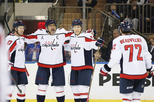 Washington Capitals players react after a goal by Anthony Beauvillier (72) during the second period of an NHL hockey game against the New York Rangers, Sunday, Oct. 12, 2025, in New York. (AP Photo/Heather Khalifa) Washington Capitals players react after a goal by Anthony Beauvillier (72) during the second period of an NHL hockey game against the New York Rangers, Sunday, Oct. 12, 2025, in New York. (AP Photo/Heather Khalifa)